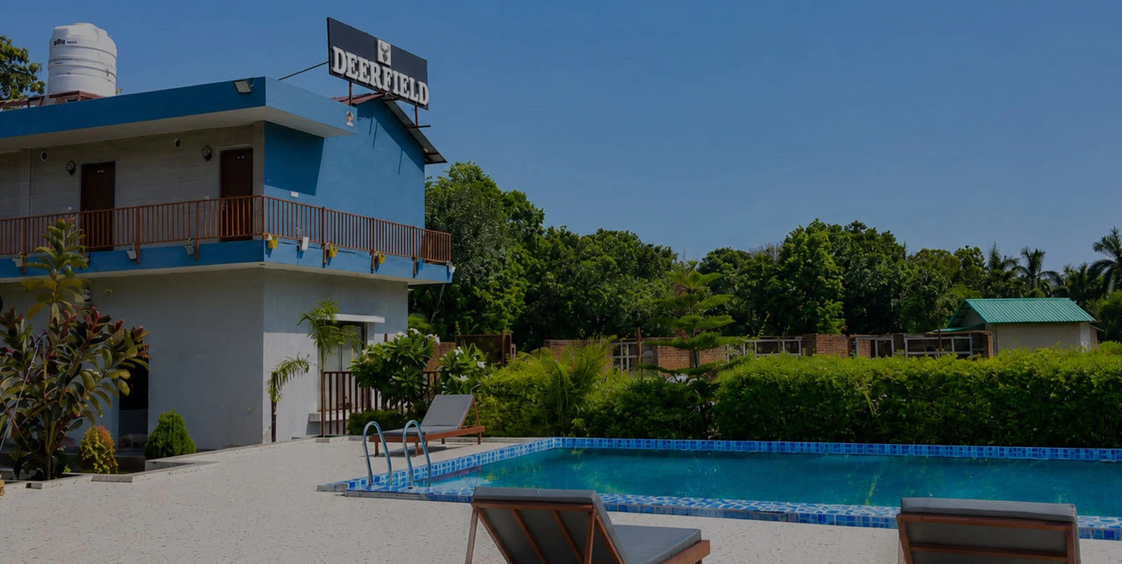 Deerfield cottage building with the swimingpool image